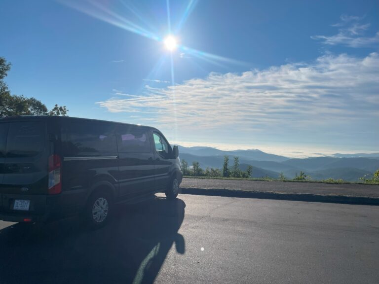 van with mountains in background